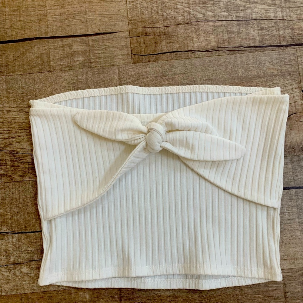 White crop top with bow.